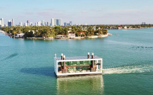 Luxury Miami houseboat with Singer Island and Miami in the background