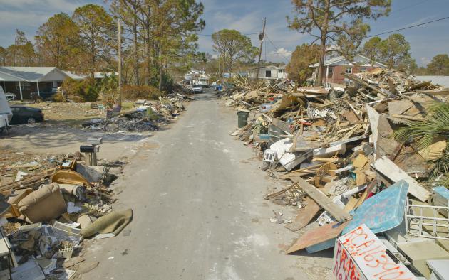 debris along Florida road after hurricane Ian