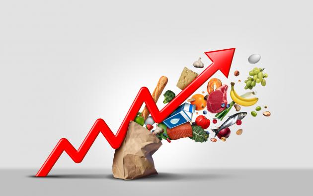 Food exploding from a bag of groceries with a red arrow heading upward
