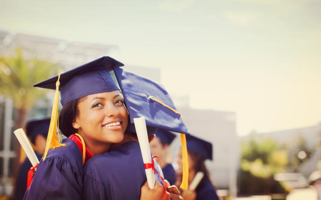 Graduates hugging