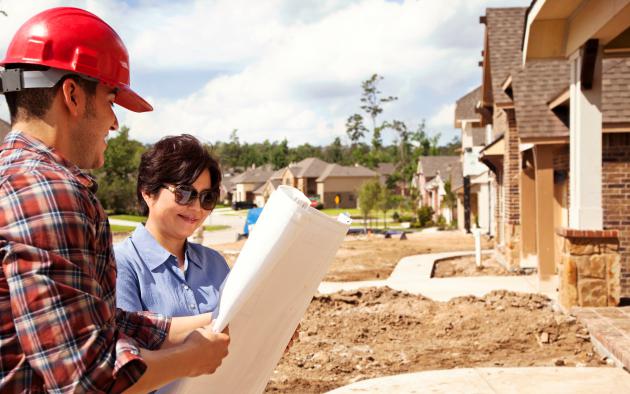 contractor meeting on home building site