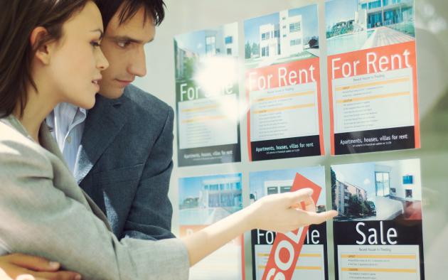 couple looking at houses for rent