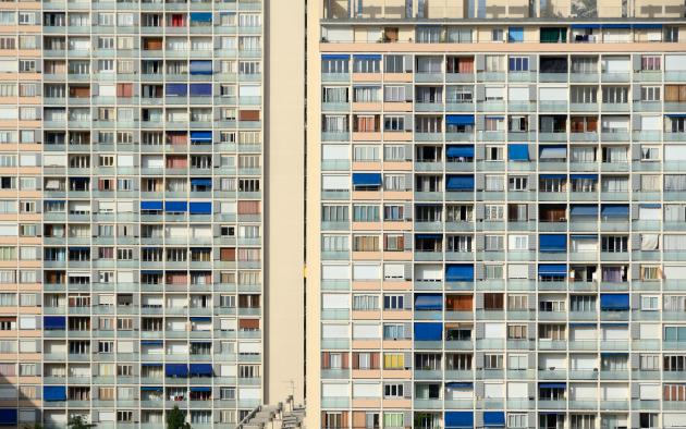 Side of building with hundreds of apartments
