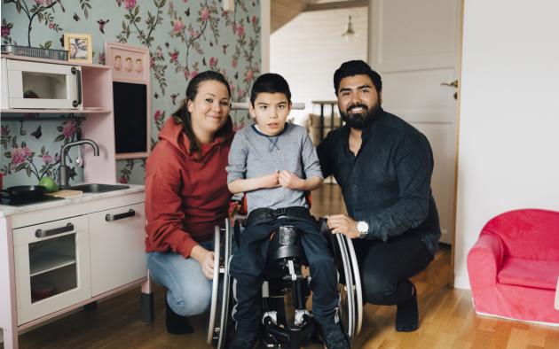 Playroom with Mom, Dad and child in a wheelchair