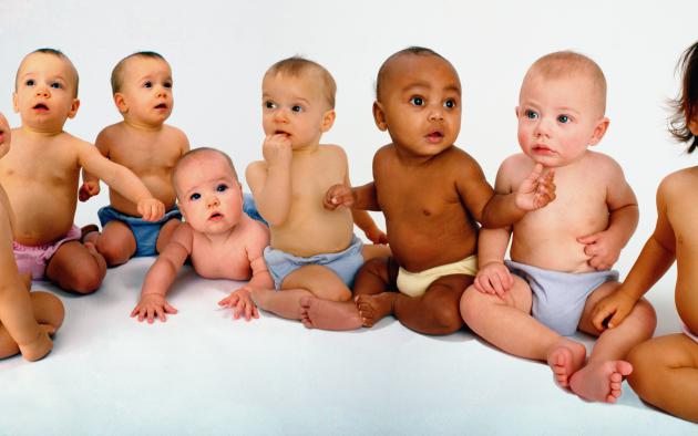 group of babies (3 to 5 months) wearing diapers