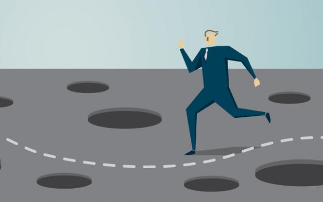 illustration of a business man avoiding holes in the ground