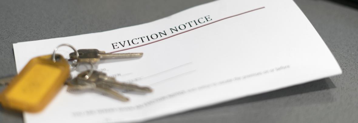 Eviction letter with keys sitting on top