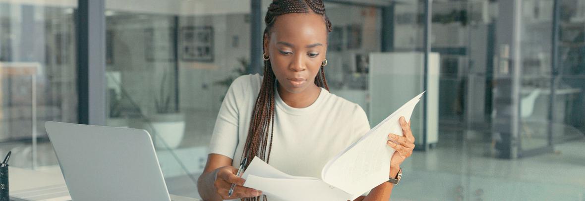 businesswoman-reviewing-papers
