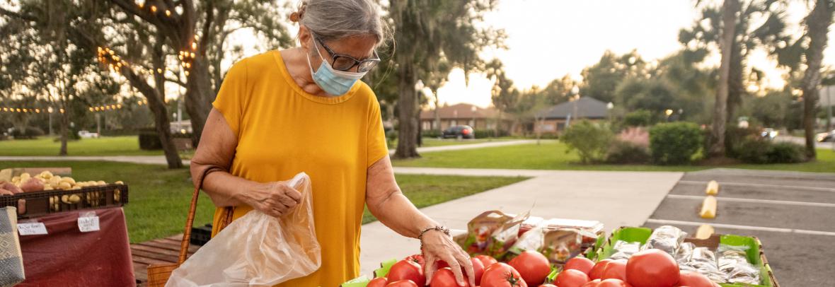 A woman in Apopka shops at a farmer's market