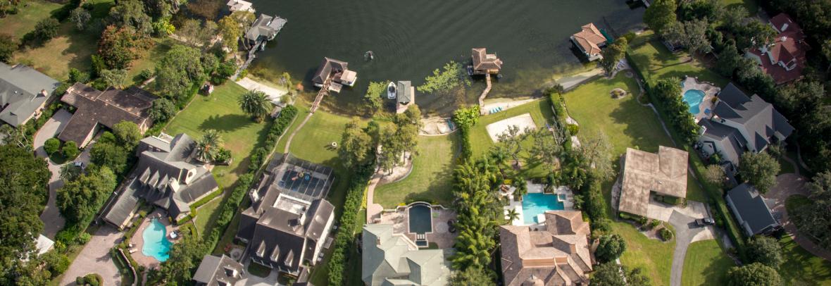 aerial view of large houses by lake in Orlando, Fla.