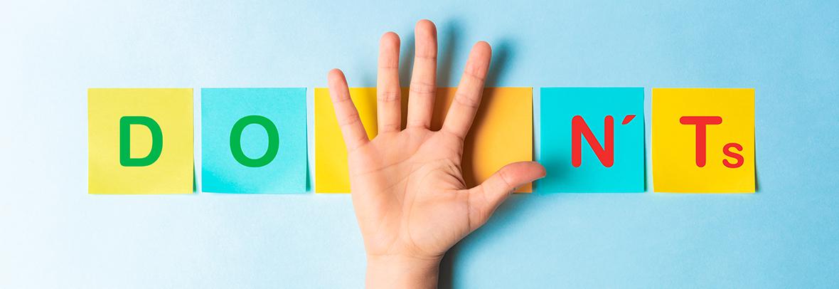 Photo illustration of a hand that divides the words Do and Don't