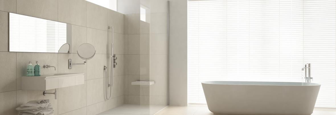 minimalist white bathroom with separate tub and shower