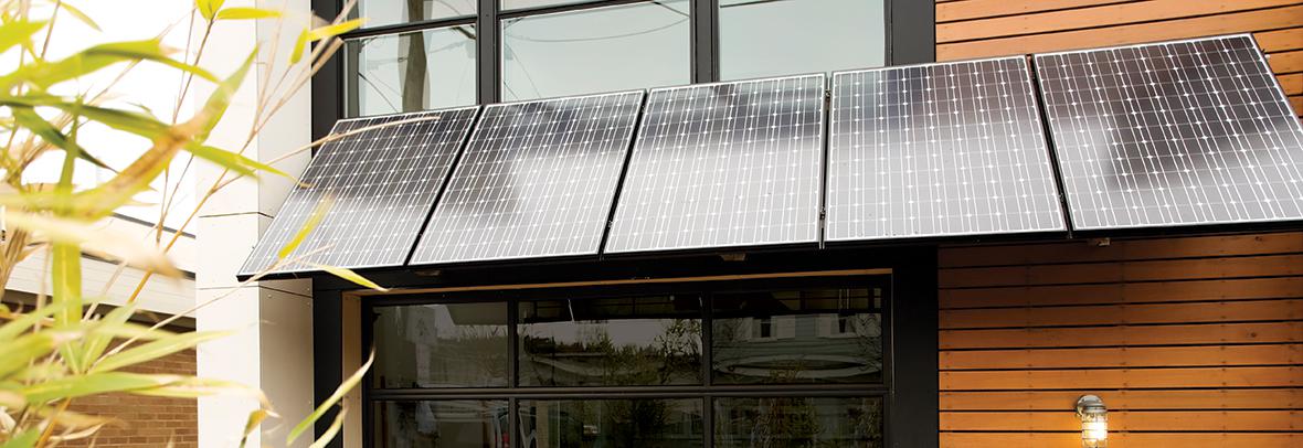 Photo of a modern home with solar panels