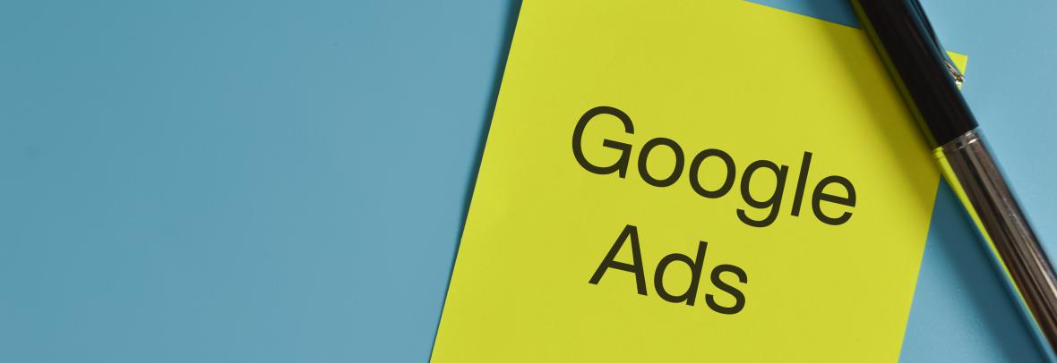 top view of pen and memo note written with Google Ads