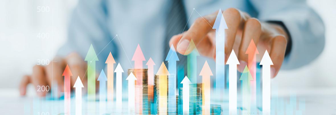 photo of a business mans hand with data bar chart