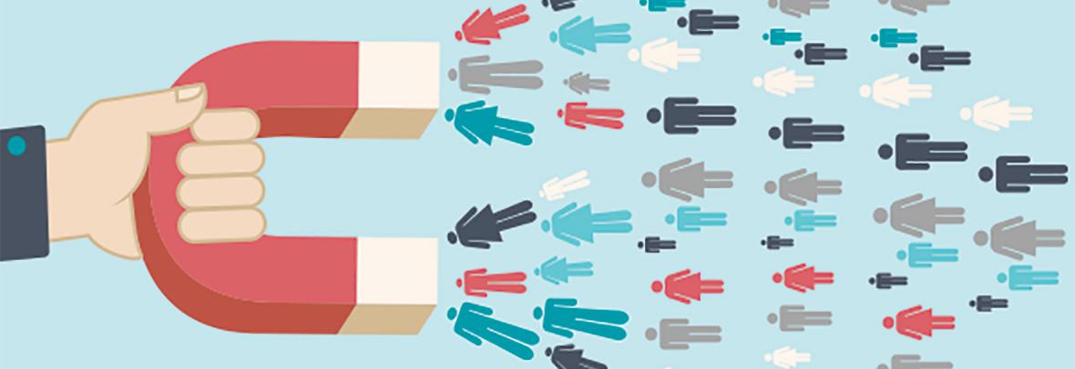illustration of a hand holding a magnet drawing people in