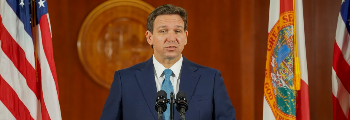 Gov. Ron DeSantis speaks at a podium