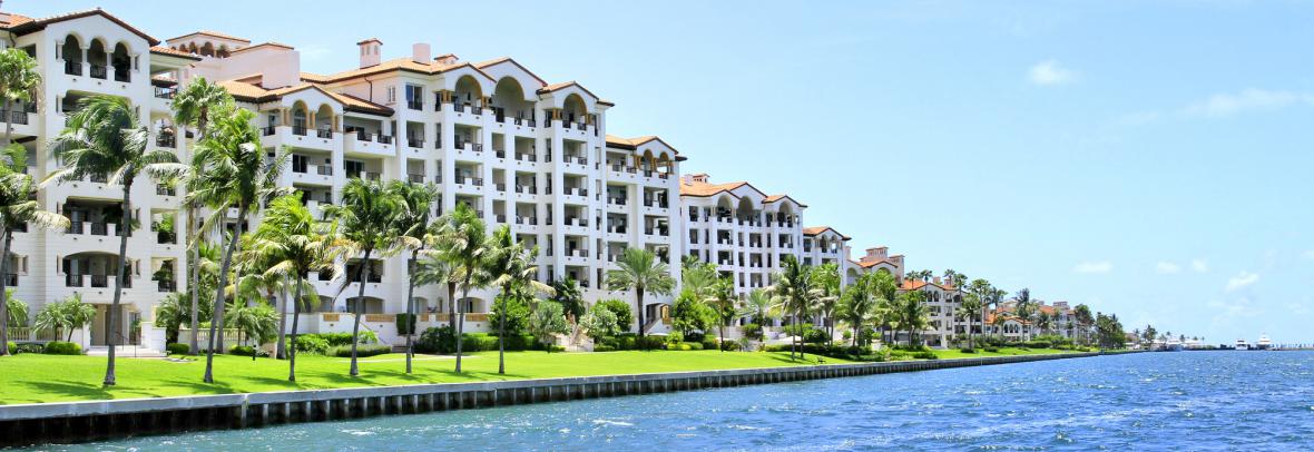 row of condos on the ocean