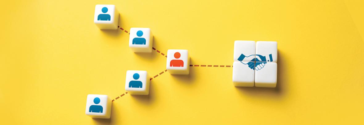 photo illustration of squares with people shapes on them coming together at one square representing the mediator