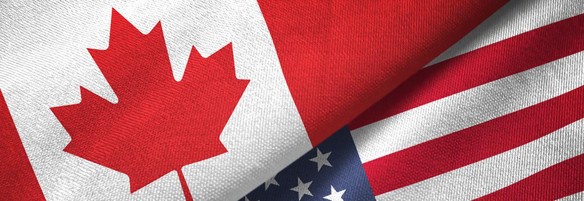 photo of Canadian and American flags folded together