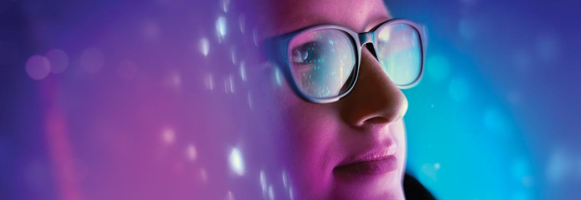 photo of a woman looking into cyberspace blue background
