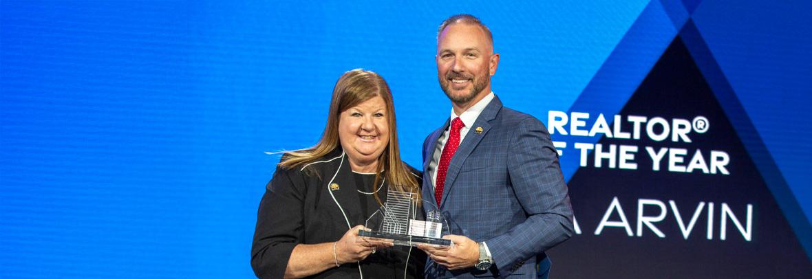 2024 Florida Realtors President Gia Arvin was awarded Realtor of the Year. Arvin is pictured with 2025 President Tim W.