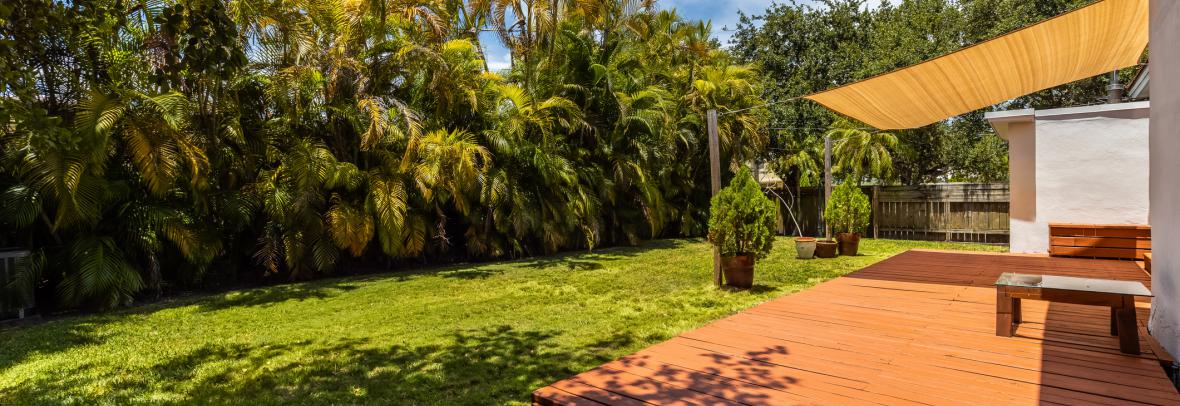 backyard deck overlooking woodlands 