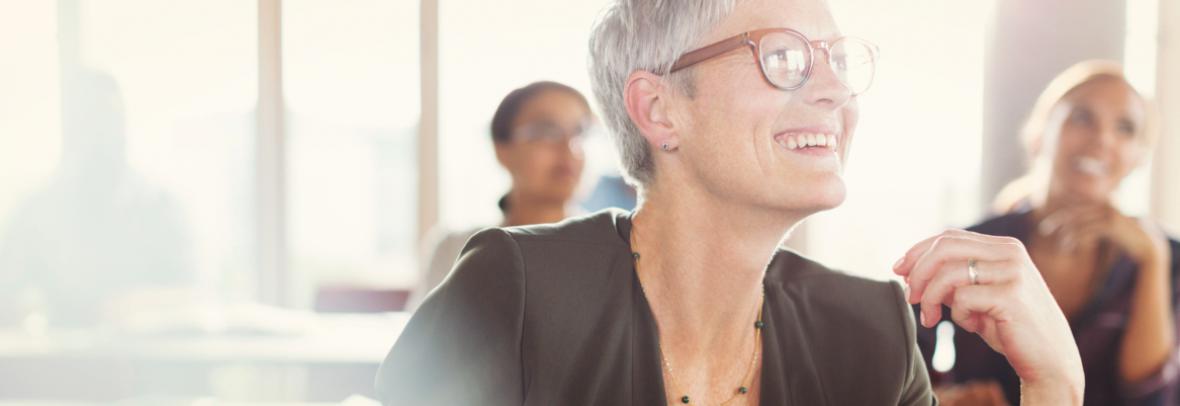 woman smiling in a class