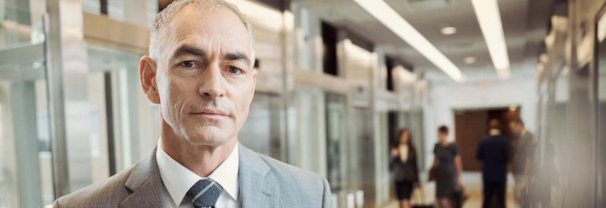 man in suit in an office