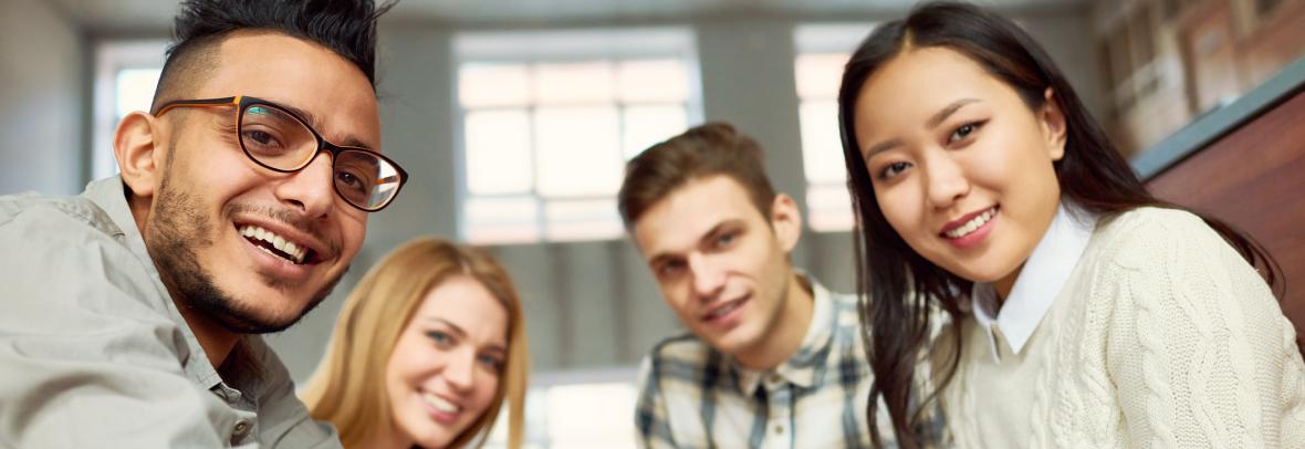 smiling college students in library