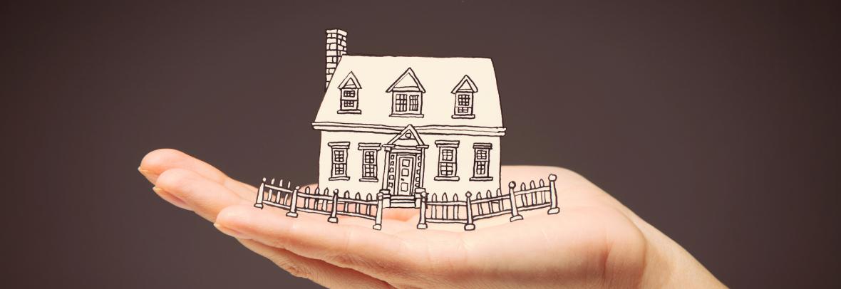 illustration of hand holding a house