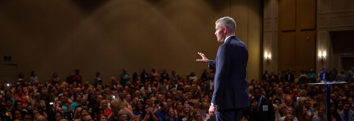 Speaker Ryan Serhant addresses the audience