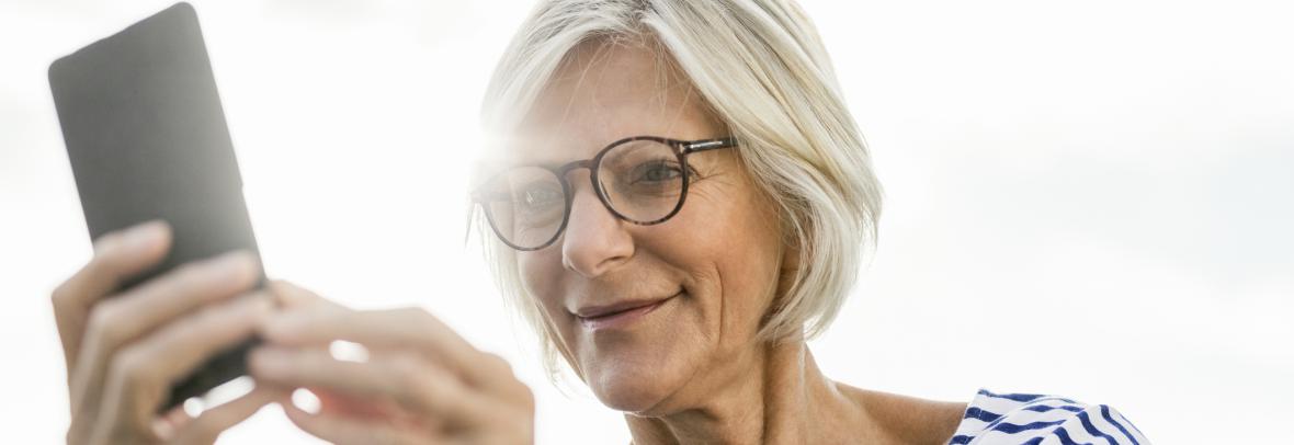 woman looking a cell phone