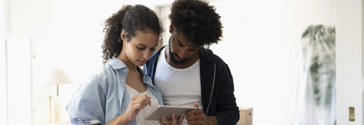 Couple looking at an ipad