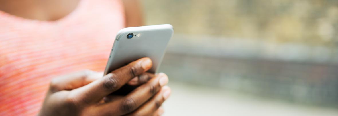 closeup of person's hand holding a cell phone