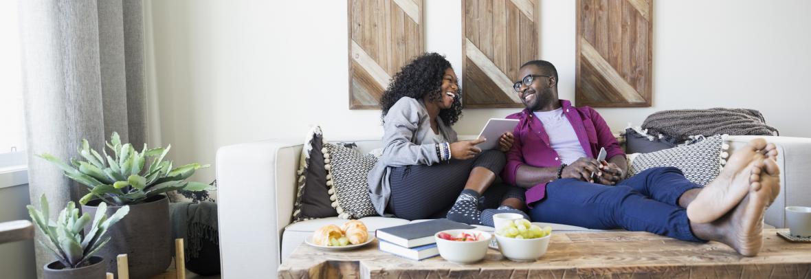 Young couple relaxing on couch