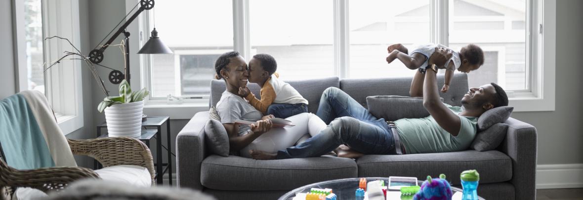 mom and with small children on couch