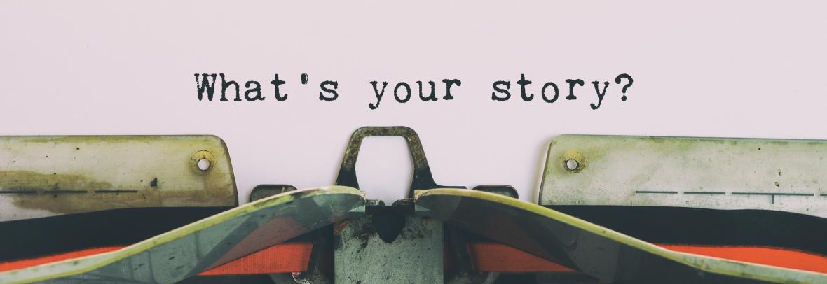 typewriter with words "what's your story?"