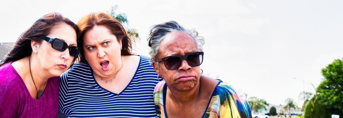 women with disgusted looks on their faces