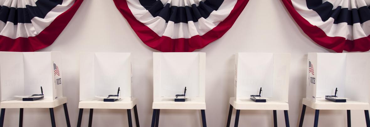 Line of empty voting booths