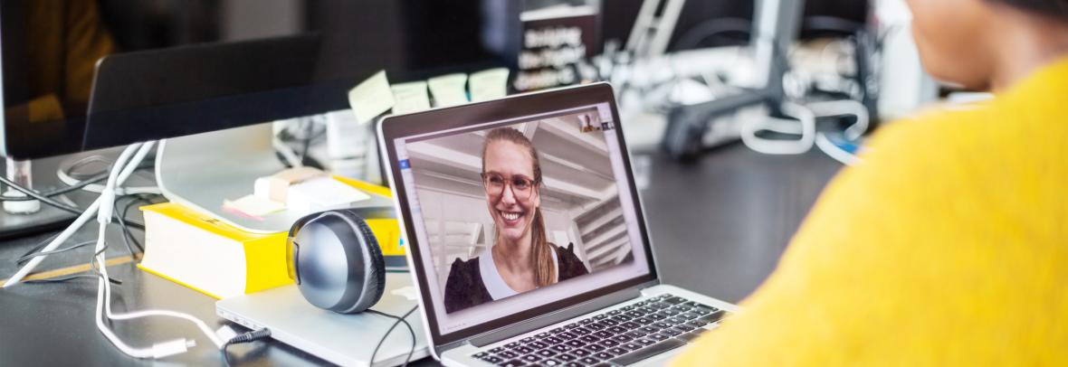 woman looking at laptop screen