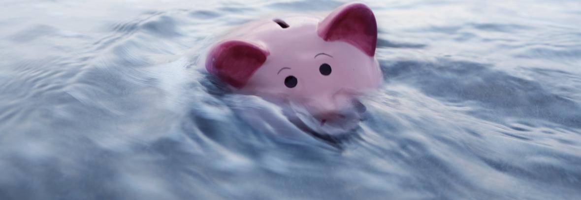 bankruptcy, piggy bank almost under water
