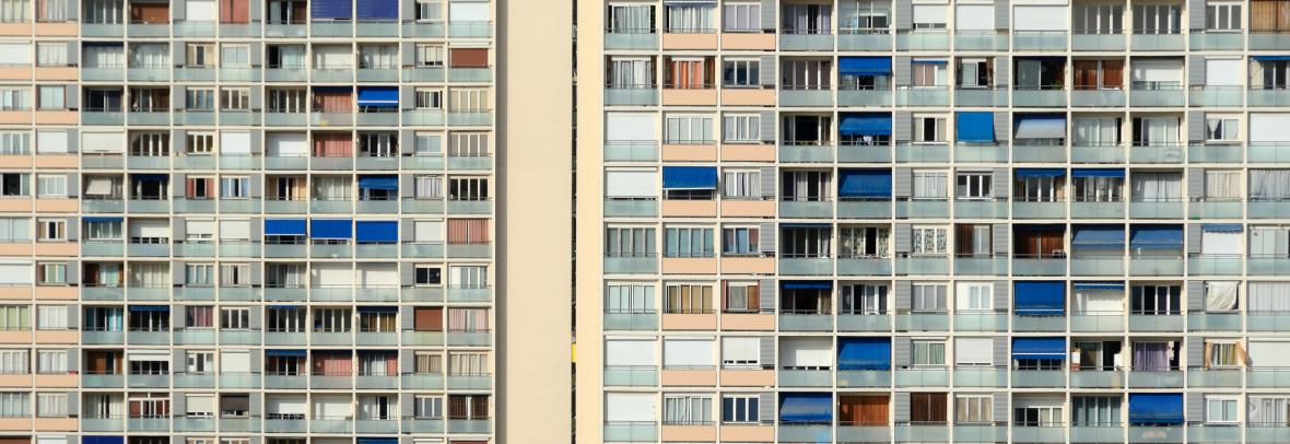 Side of building with hundreds of apartments