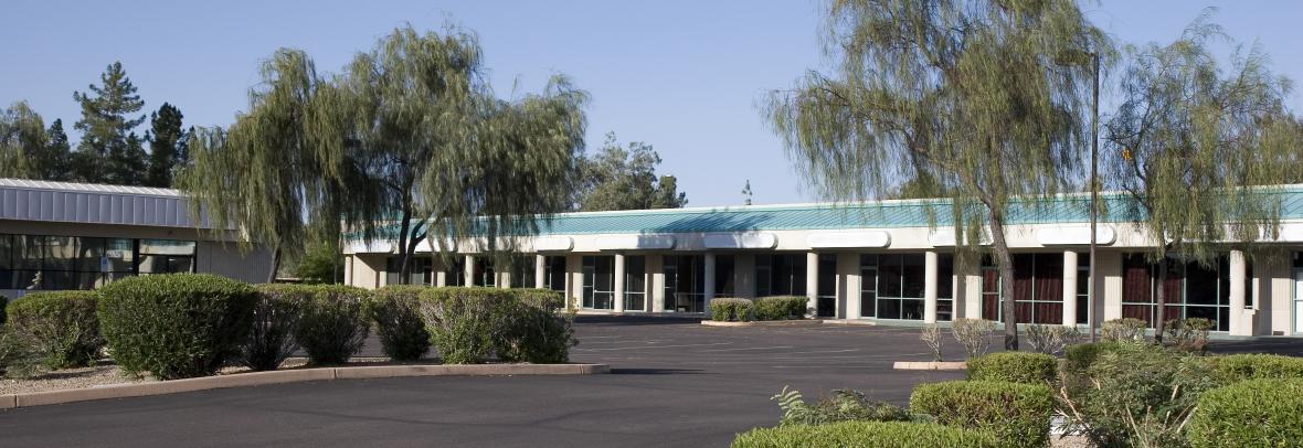 Strip mall with an empty parking lot