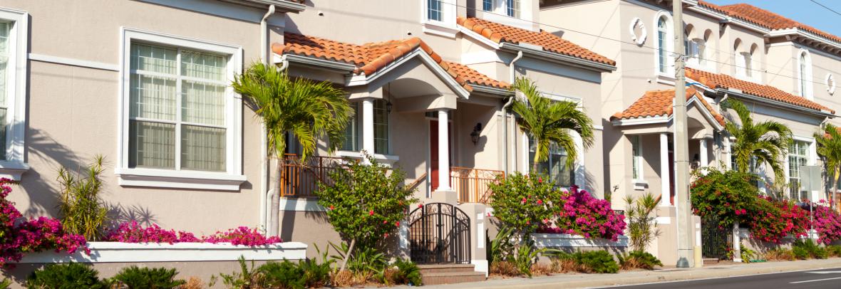 Row of tan townhouses