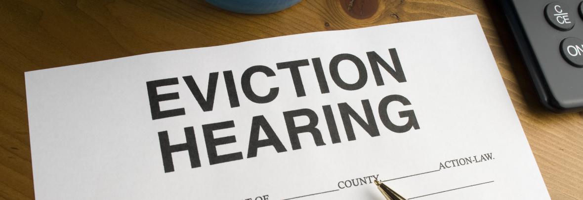 Eviction hearing paperwork form with a penKLH49