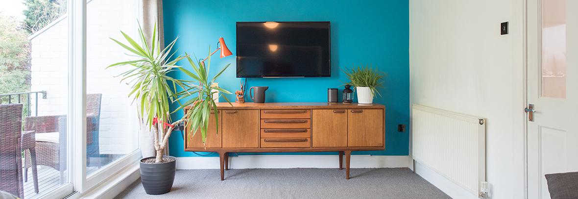 Beautifully decorated living room with mid century modern furniture