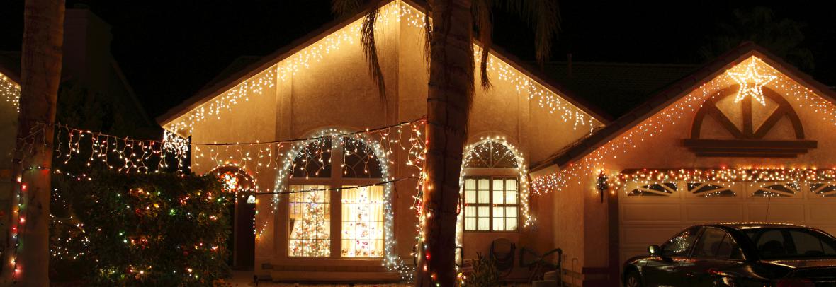 Night photo of Florida home with Christmas lights