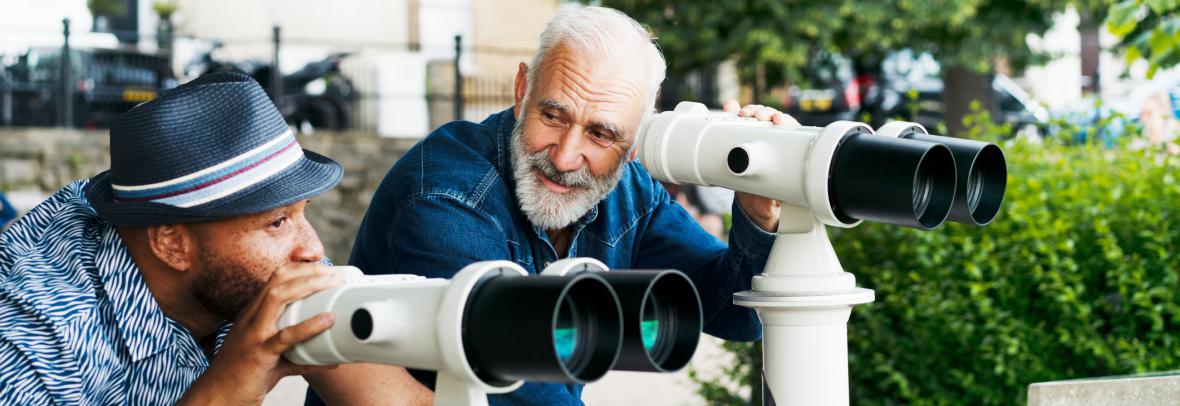 A millennial and boomer look through telescopes