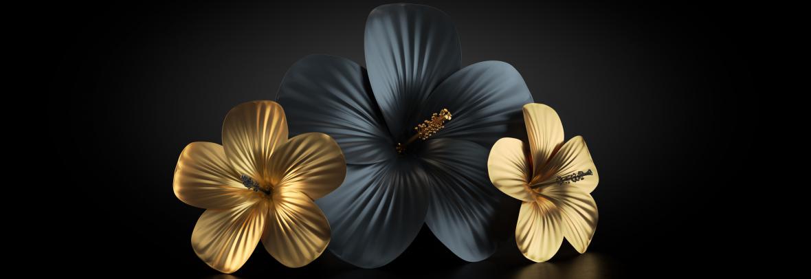 Large black flower bordered by two smaller gold flowers
